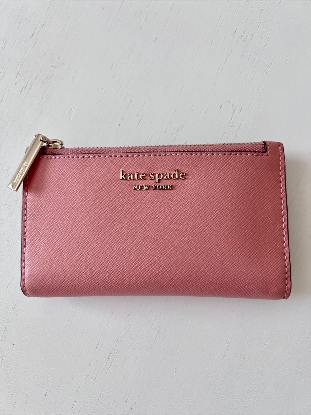 Kate Spade Spencer Small Slim Bifold Wallet in Pink/Beige